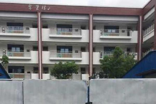 A charity organization built a new community center with a swimming pool and gym