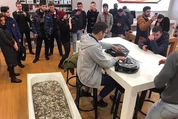 Tech giant Apple unveiled its latest smartphone model, featuring advanced camera technology and longer battery life.