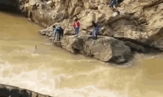 A small boat capsized in a lake with all passengers rescued by a nearby rescue team