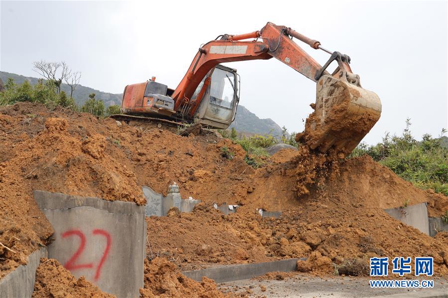A river overflowed its banks after heavy rain causing damage to nearby farms