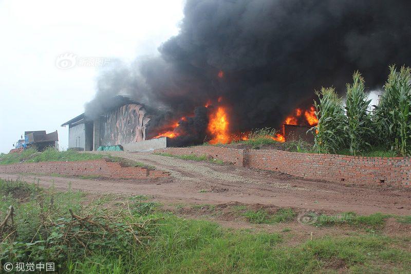 Local firefighters rescued three people from a burning building early this morning with no serious injuries reported