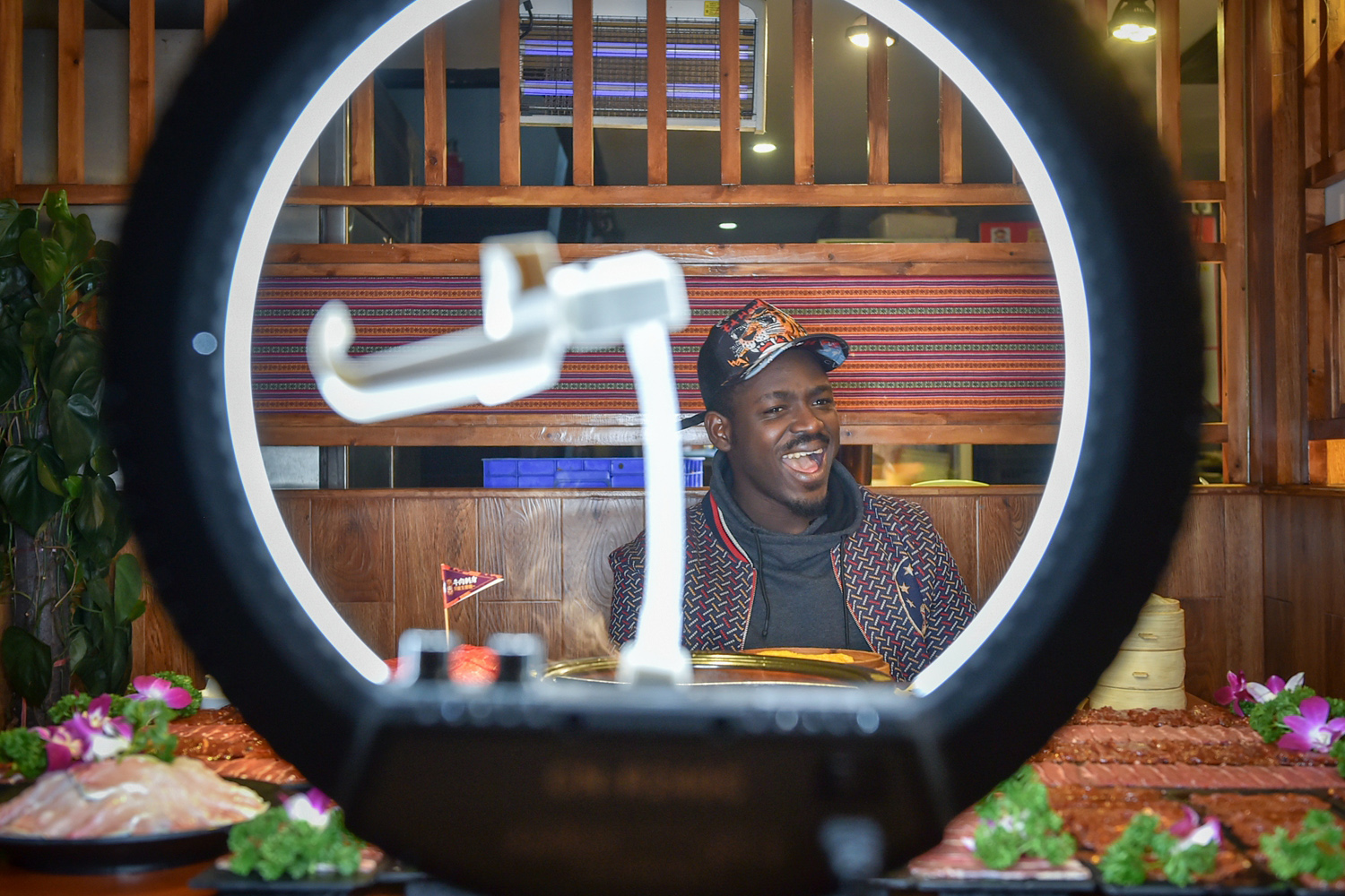 A new restaurant specializing in plant-based burgers opened to long lines of customers