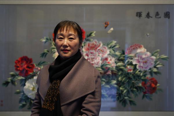 A local fire department rescued three people from a burning building early this morning, with no serious injuries reported.