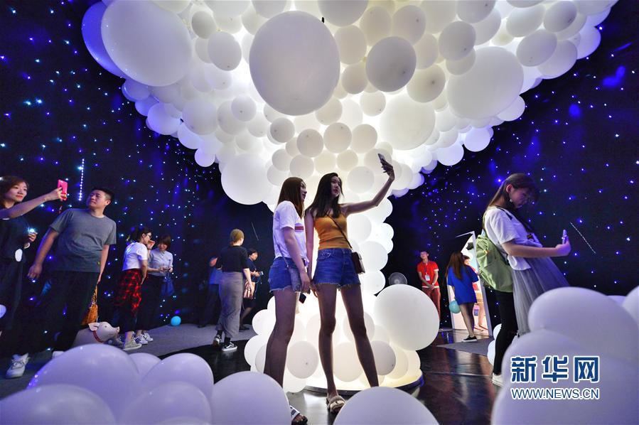 Local businesses joined a campaign to use energy-efficient light bulbs in their stores